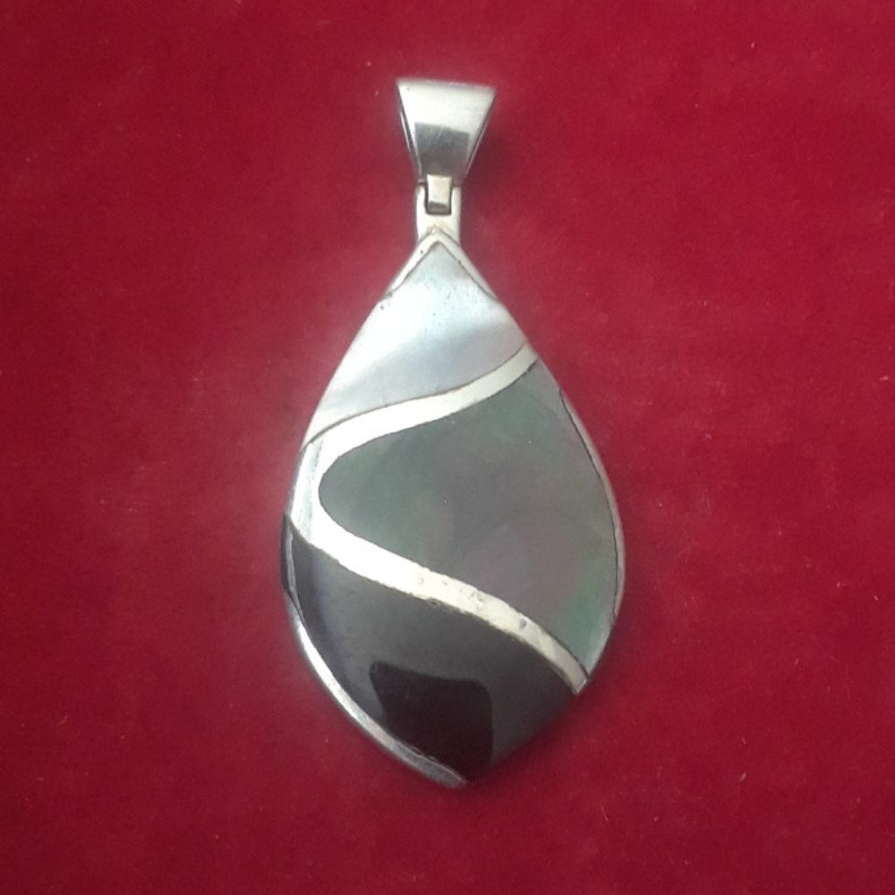 Multi stone pendant in silver